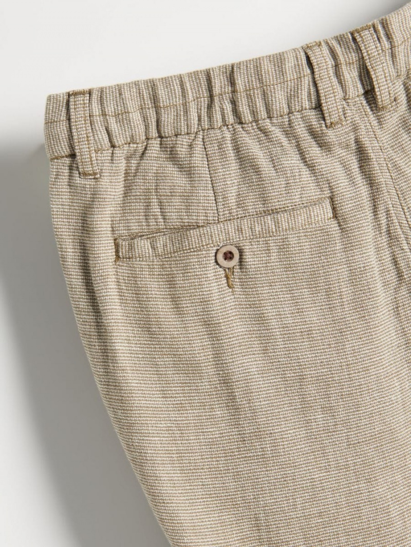 Reserved Regular fit chino trousers Zielone | TOXQKFS-94